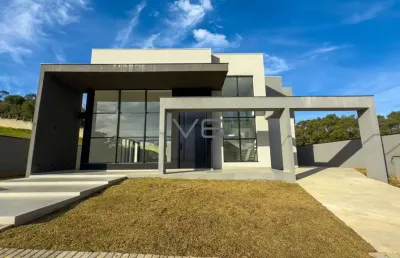 Casa com 548m², 4 suítes, 4 vagas de garagem no bairro tanguá, curitiba -pr.