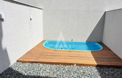 Sobrado geminado com piscina no bairro costa e  silva