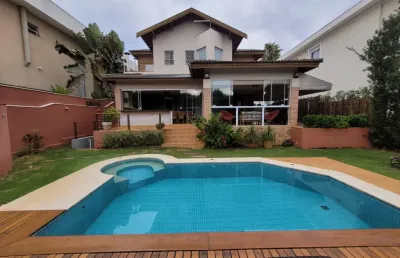 Casa à venda estilo inglês no condomínio alphaville dom pedro em campinas / sp
