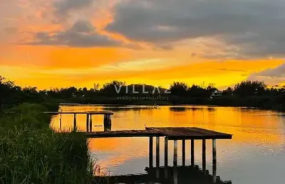 Casa beira da lagoa com trapiche na ferrugem – 3 dormitórios