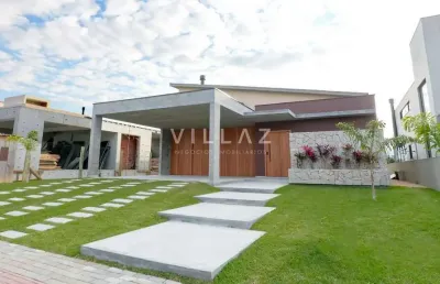 Casa térrea no garopaba internacional com 4 suítes e projeto sustentável