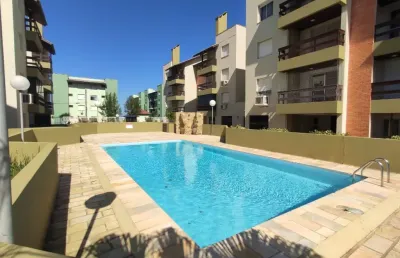 Apartamento em capão novo em condominio proximo ao mar