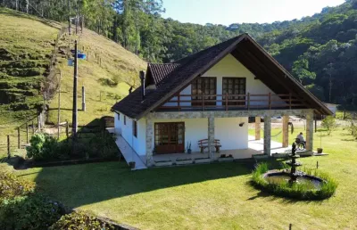 Lindo sítio em águas mornas sc com casa mobiliada, 6.5 hectares e com casa (porteira fechada)