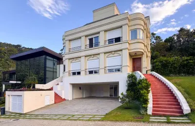 Casa à venda em condomínio em cacupé, 319m² de privativa, 4 suítes e 3 vagas, r$ 4.950.000,00