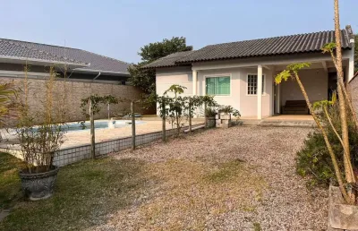 Casa com amplo terreno perto da praia mar aberto - palhoça