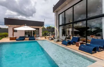 Casa a venda no condomínio ninho verde ii, imóvel de altíssimo padrão com muito conforto e sofistic