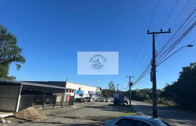 Galpões industriais com 2.032 m² construidos, num terreno de 18.011 m², frente para o asfalto, analisa permuta parcial