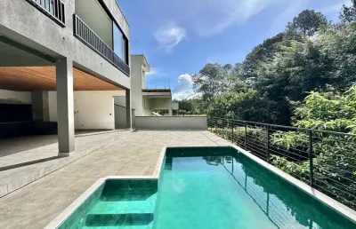 Casa nova com arquitetura moderna em condomínio fechado barueri/cotia