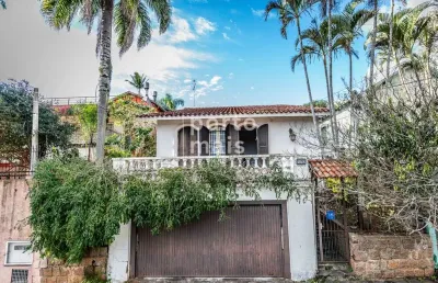 Casa com 3 quartos à venda na rua oscar tollens, 170, santa tereza, porto alegre por r$ 450.000
