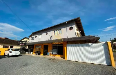 Casa com salas comerciais a venda no bairro quintino
