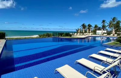 Apartamento pé na areia no edf. gran marine na beira-mar de guaxuma!