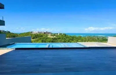 Casa de alto padrão com vista permanente para o mar