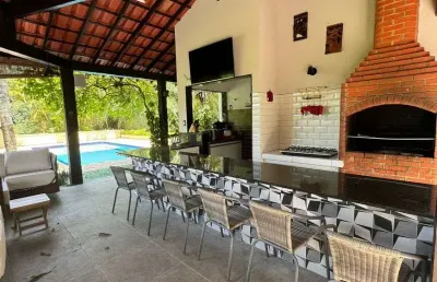 Casa de condomínio para venda com 697 metros quadrados com 5 quartos
