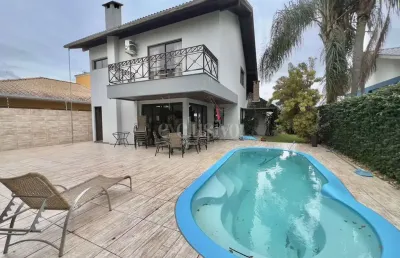 Casa com 4 quartos à venda na rua josé luiz vieira, 45, jardim atlântico, florianópolis por r$ 1.200.000