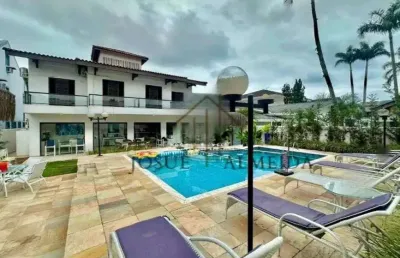 Casa em condomínio fechado com 5 quartos à venda na Rua Ezio Renato João Mora, 151, Jardim Acapulco, Guarujá