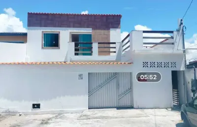Casa com ponto comercial em condomínio portal de arembepe