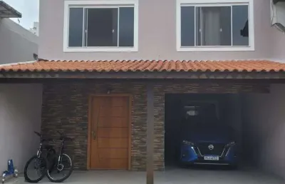 Oportunidade! casa a venda em condomínio fechado no centro de balneário