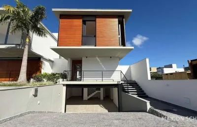 Casa com 4 suítes no loteamento porto da costa- lagoa da conceição- florianópolis/sc