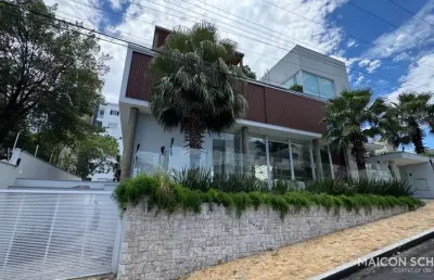 Casa com 7 suítes, elevador, pub com cinema, mobiliada e decorada, joão paulo, florianópolis/sc.