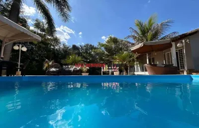 Casa em condomínio fechado com 4 quartos à venda na rodovia mg10, sn, condomínio estância da mata, jaboticatubas, 232 m2 por r$ 720.000