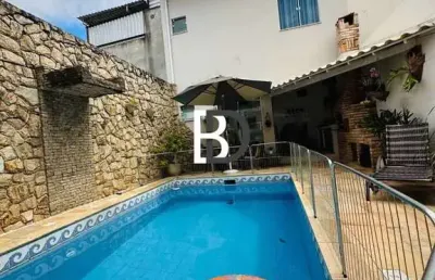 Casa com 3 quartos à venda na rua avenida doutor humberto de queiroz matoso, 10, novo horizonte, macaé, 111 m2 por r$ 700.000