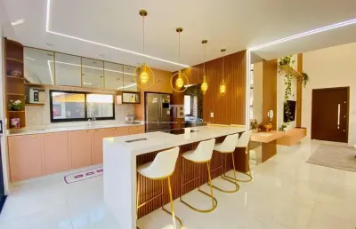 Casa semimobiliada à venda, com 4 quartos, suíte, piscina e salão de festas