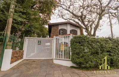 Casa com 3 quartos à venda na rua sargento nicolau dias de farias, 384, tristeza, porto alegre por r$ 2.000.000