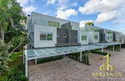 Casa em condomínio fechado com 3 quartos à venda na rua doutor ney de castilhos ferreira, 300, pedra redonda, porto alegre por r$ 2.750.000