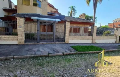 Casa com 4 quartos à venda na rua paissandu, 361, partenon, porto alegre por r$ 2.900.000