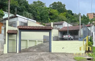 Casa com 3 quartos à venda na avenida vicente monteggia, 2406, vila nova, porto alegre por r$ 495.000