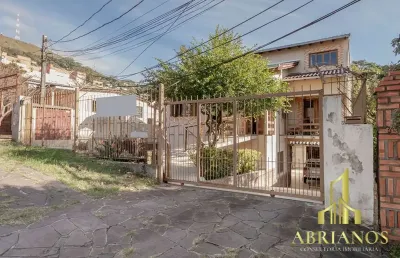 Casa com 5 quartos à venda na rua patrimonio, 119, glória, porto alegre por r$ 731.000