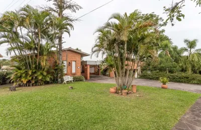 Casa em condomínio fechado com 5 quartos à venda na avenida firmino octávio bimbi, 255, cavalhada, porto alegre por r$ 1.390.000