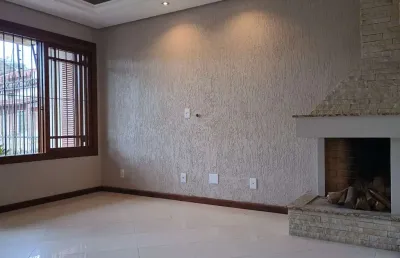 Casa em condomínio fechado com 3 quartos à venda na rua doutor lauro miguel sturm, 506, hípica, porto alegre por r$ 890.000