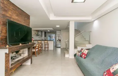 Casa com 3 quartos à venda na rua aldo sani, 143, hípica, porto alegre por r$ 740.000