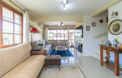 Casa em condomínio fechado com 3 quartos à venda na rua general rondon, 1259, tristeza, porto alegre por r$ 890.000