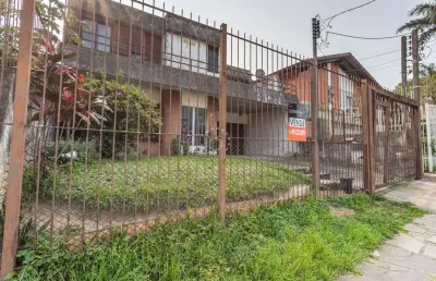 Casa com 4 quartos à venda na rua tupã, 88, vila assunção, porto alegre por r$ 850.000