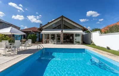 Casa em condomínio fechado com 3 quartos à venda na avenida juca batista, 8000, belém novo, porto alegre por r$ 1.880.000
