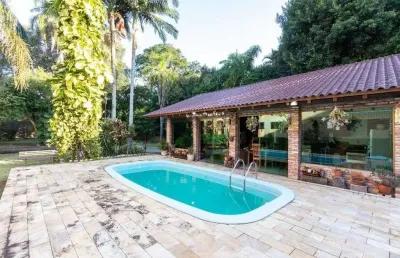 Casa com 4 quartos à venda na rua doutor armando barbedo, 158, tristeza, porto alegre por r$ 3.400.000