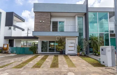 Casa em condomínio fechado com 3 quartos à venda na rua eroni soares machado, 300, hípica, porto alegre por r$ 890.000