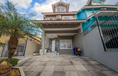 Casa com 3 quartos à venda na rua padre joão batista reus, 2125, vila conceição, porto alegre por r$ 840.000