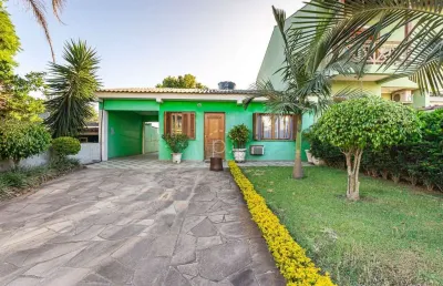 Casa com 4 quartos à venda na rua monte claro, 106, hípica, porto alegre por r$ 459.000