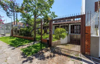 Casa com 3 quartos à venda na rua general rondon, 938, tristeza, porto alegre por r$ 840.000