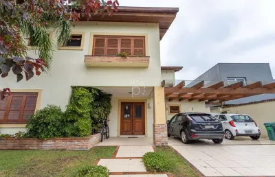 Casa em condomínio fechado com 5 quartos à venda na avenida juca batista, 8000, belém novo, porto alegre por r$ 3.450.000