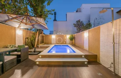 Casa em condomínio fechado com 3 quartos à venda na rua goitacaz, 606, vila assunção, porto alegre por r$ 1.595.000