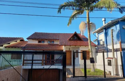 Casa com 3 quartos à venda na rua professor leonardo tochtrop, 19, ipanema, porto alegre por r$ 1.200.000
