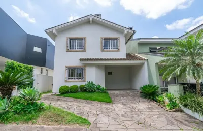 Casa em condomínio fechado com 3 quartos à venda na avenida edgar pires de castro, 540, hípica, porto alegre por r$ 845.000