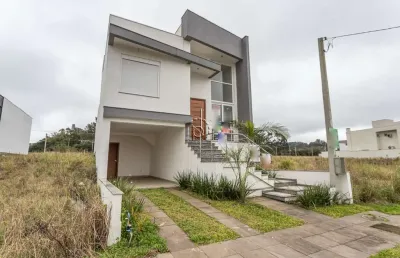 Casa com 3 quartos à venda na affonso lunardelli, 75, hípica, porto alegre por r$ 650.000