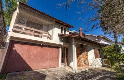 Casa com 3 quartos à venda na rua adão pinheiro da silva, 315, ipanema, porto alegre por r$ 850.000