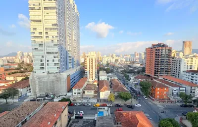 100m2,aparecida,2 quadras da praia,2 vagas de garagem demarcadas