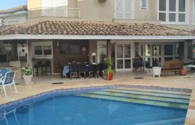Casa a venda no condomínio fechado jardim acapulco na praia do pernambuco guarujá sp, com 05 suítes
